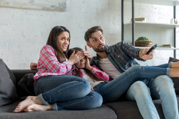 istock Family shocked for TV 1196167220