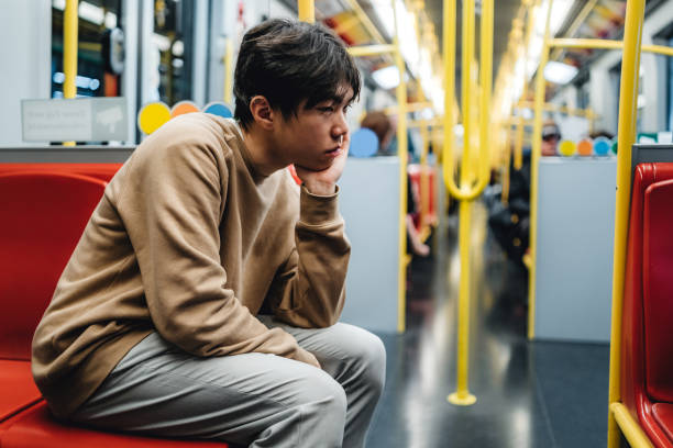 istock Sad teenage boy in subway 1196168612