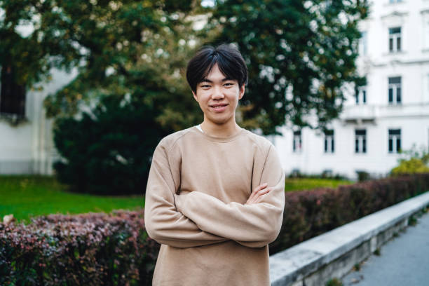istock Smiling Asian teenage boy 1196168625