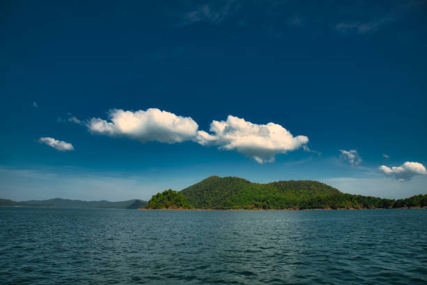 Along the way to Smart Island from Myeik, there are numerous small island in the Andaman sea. The sky was very clean and only a few cloud slowly moving over the island. I found it compelling to take the shot at this calmness.