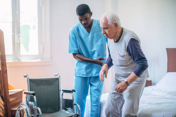 istock Male nurse and senior man 1196168759