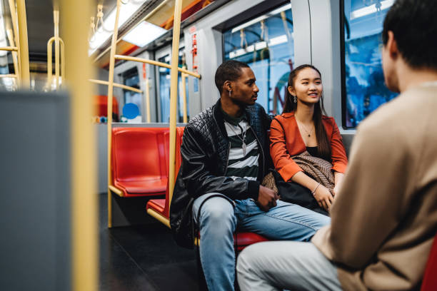 istock Teenagers in subway train 1196168775