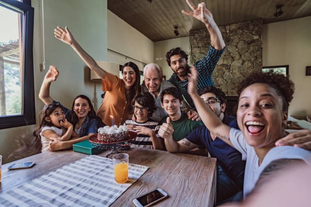 istock Boy celebrating birthday with family 1196170612