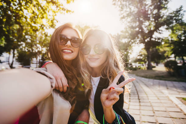istock Taking selfie in a public park 1196176517