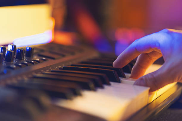istock Produce electronic music in studio and playing on midi keyboard 1196177750