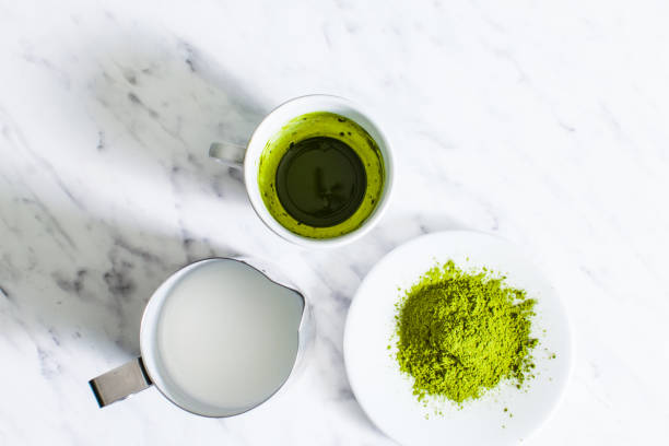 istock A cup of green Matcha tea with milk jug 1196178701