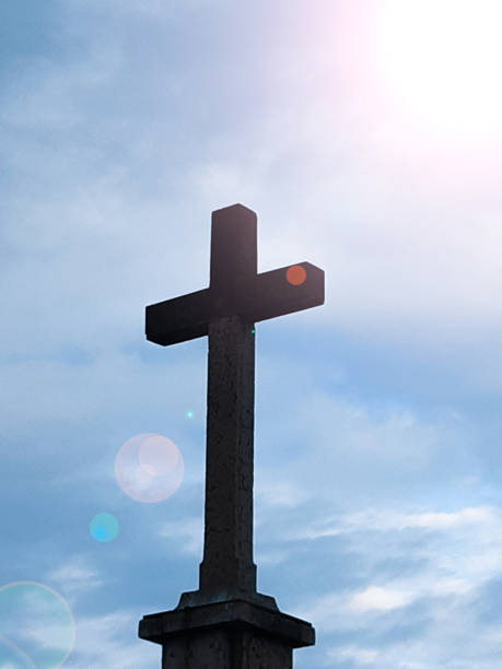 istock Cross in the sky and sunflair 1196179045