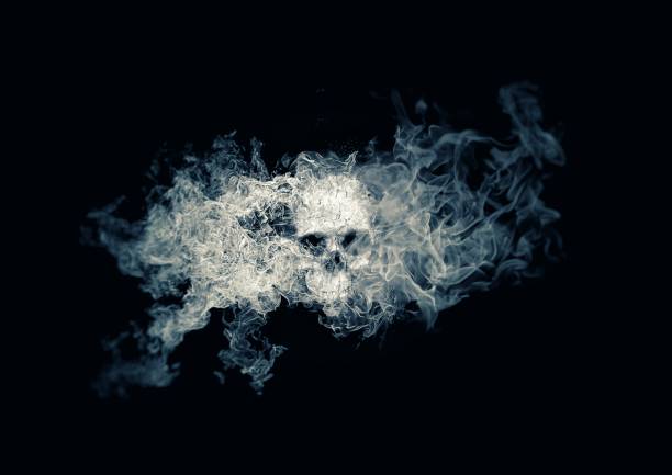 istock Abstract skull wrapped in smoke floating in the dark 1196190726