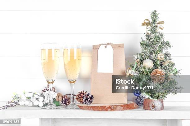 Wedding Or Christmas Tag Mockap Layout Of A Wedding Tag On A Craft Bag With Christmas Tree Stock Photo - Download Image Now