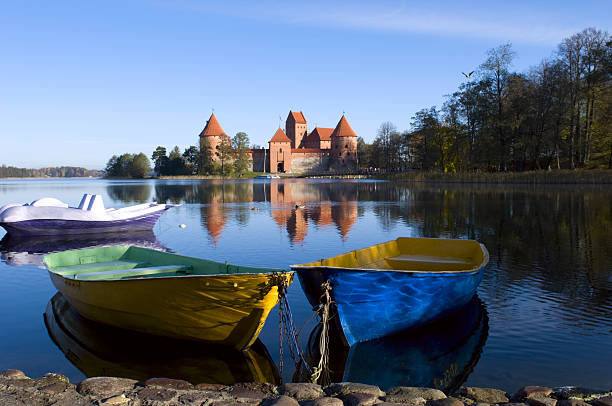istock Trakai, Lithuania - boats with a castle in the background 119619225