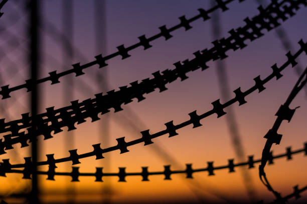 istock Silhouette Razor Barbed Tape Wire 