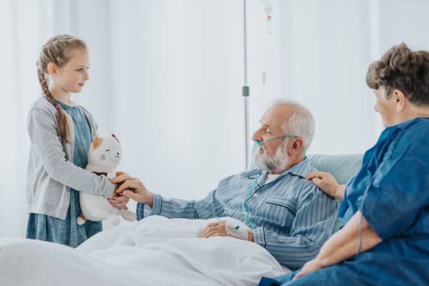 istock Girl visiting grandfather 1196198180