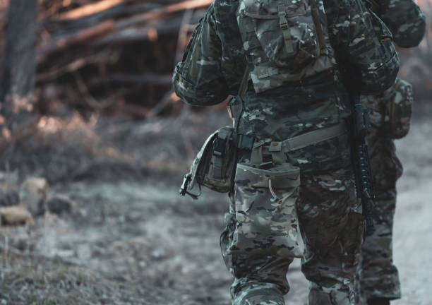 istock Midsection Of Solider On Field 1196206043