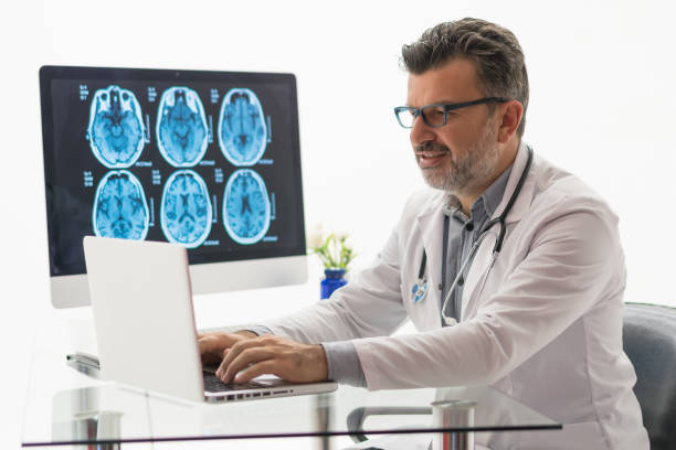 istock The doctor uses a laptop 1196207867
