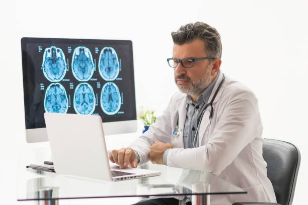 istock The doctor uses a laptop 1196208257