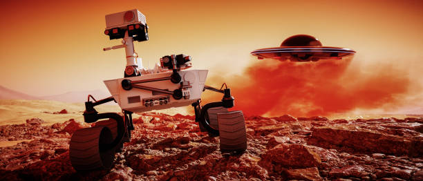 istock an unidentified flying object lands behind a mars rover (3d rendering) 1196209655