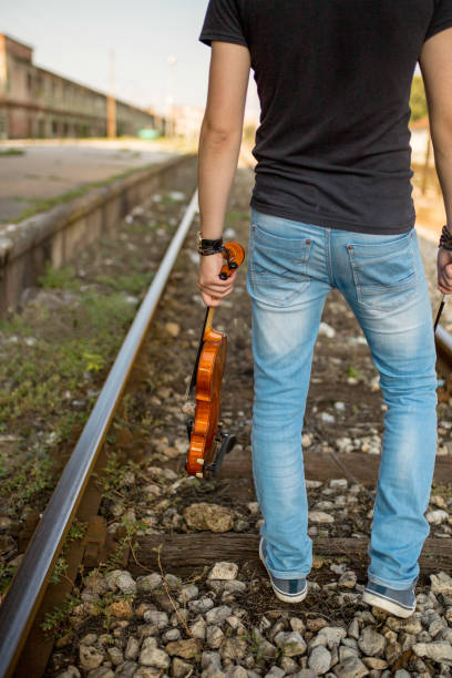 istock Street musician playing violin 1196210097