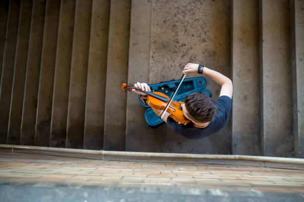 istock Street musician playing violin 1196210257