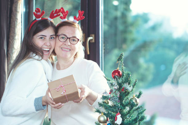 istock Celebrating christmas with christmas gift 1196211152