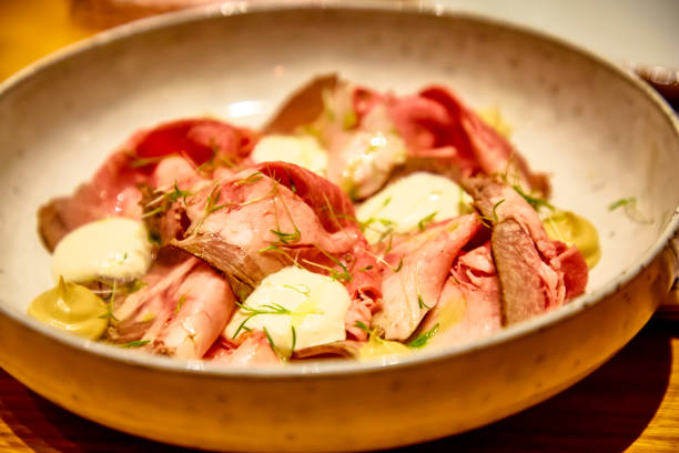 istock Roast beef with sauce and mustard is on the plate 1196211762