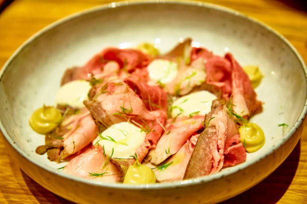 istock Roast beef with sauce and mustard is on the plate 1196212493