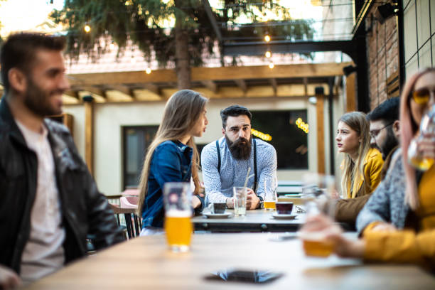istock Friends enjoying in a pub after work 1196215337