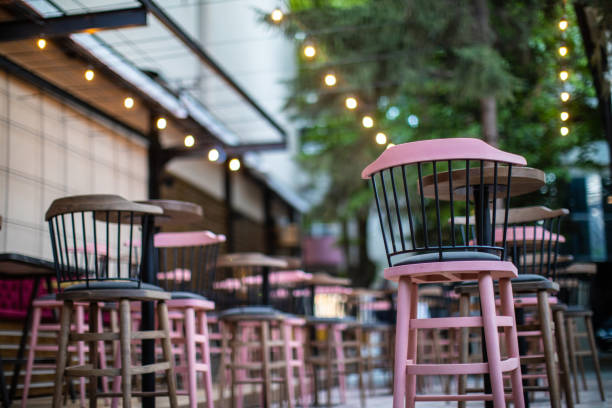 istock Modern pink chairs at outdoor cafe 1196215411