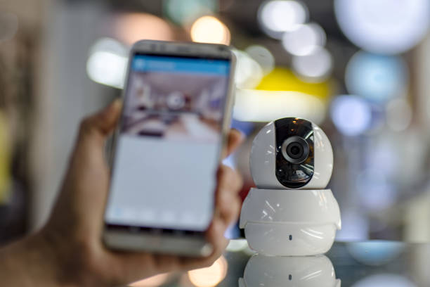 istock Security camera. IP Camera connect to smart phone. 1196219188