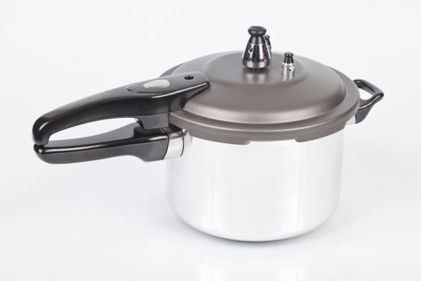 istock Closed pressure cooker; lid with safety valves 1196228533