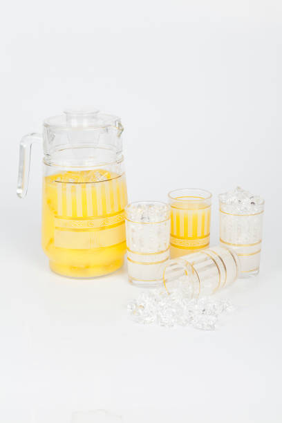 istock Set of jug with four glass cups. 1196228567