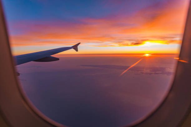 istock Amazing sunset from the airplane window over Qatar 1196230533