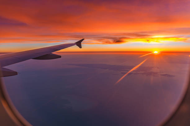 istock Amazing sunset from the airplane window over Qatar 1196230536