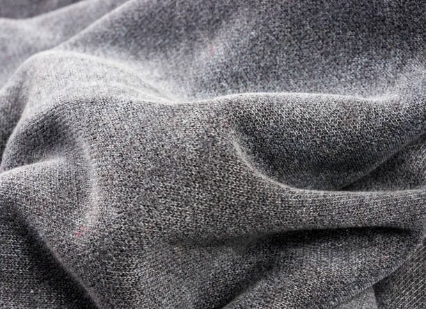 istock clothing items stonewashed cotton fabric texture with seams, clasps, buttons and rivets, macro 1196231743