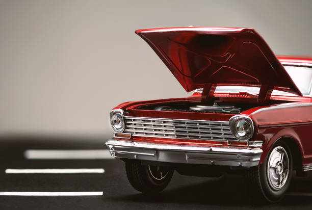istock Front view of a Red classic automobile with open hood. 1196232028