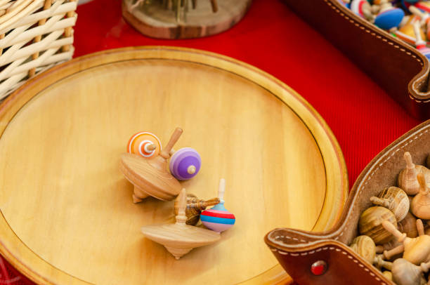 istock Spinning wooden whirligig 1196234368
