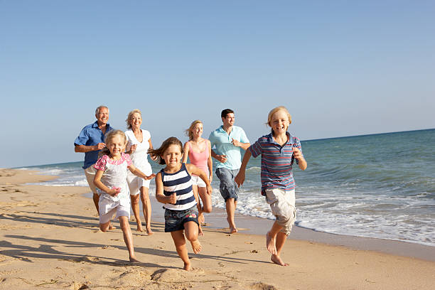 istock Three Generation Family On Beach Holiday 119624068