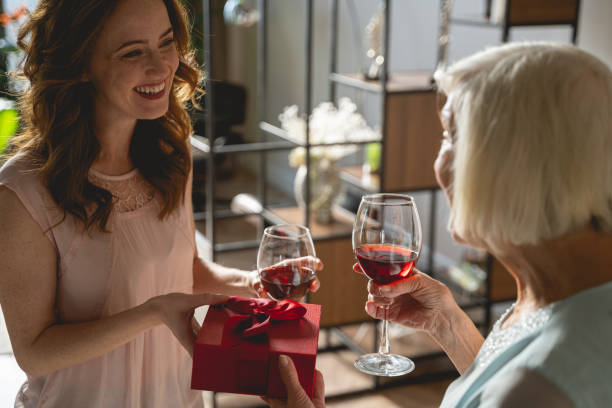 istock Positive delighted girl visiting her kind granny 1196243739