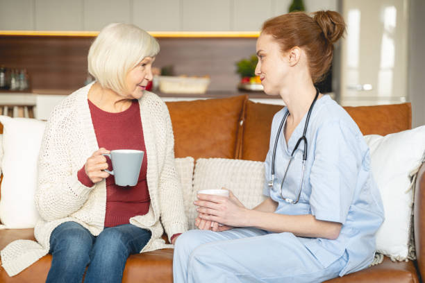 istock Positive delighted young doctor consulting her patient 1196243841