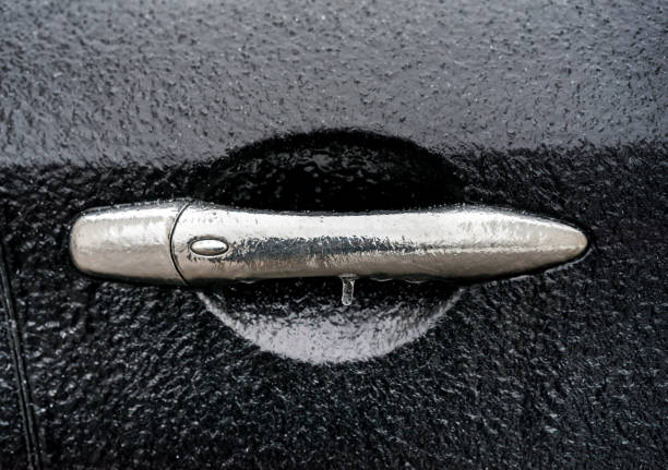 istock Car covered with ice after freezing rain 1196252339