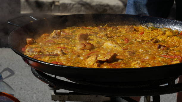 istock Cooking paellas outdoors in Valencia 1196253840
