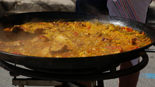 istock Cooking paellas outdoors in Valencia 1196254048