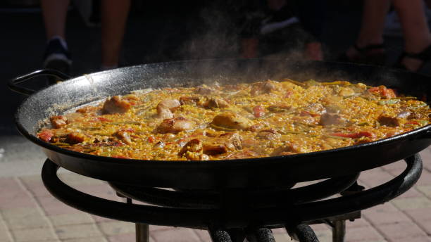 istock Cooking paellas outdoors in Valencia 1196254413