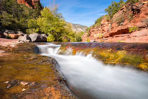 The natural beauty of Slide Rock State Park with its rock water slides in Oak Creek Canyon near Sedona in northern Arizona.