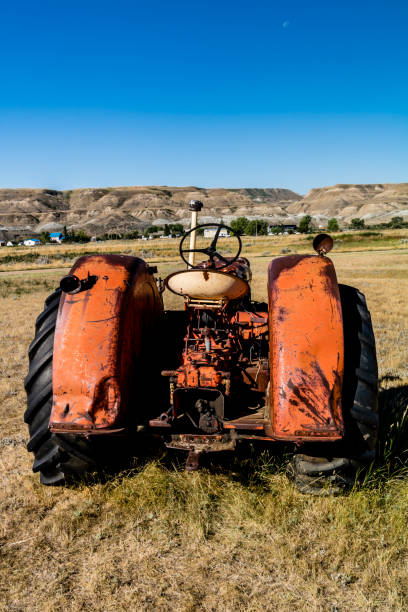 istock Assorted farming equipment in a field. Big Valley, alberta, Canada 1196257213