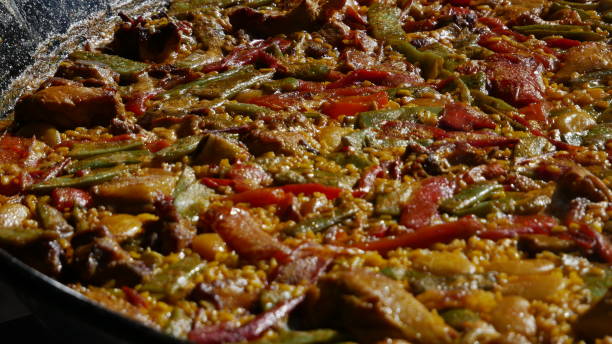 istock Cooking paellas outdoors in Valencia 1196257331