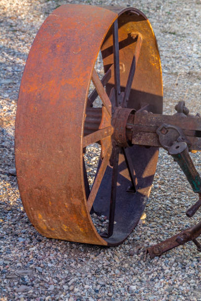 istock Heavy duty wagon wheels sit idle. Nanton, Alberta, Canada 1196257423