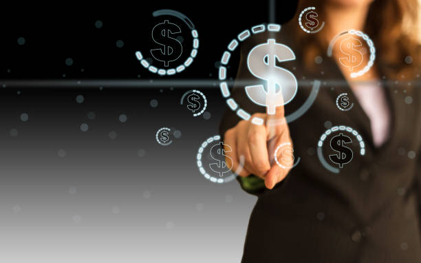 istock Businesswoman Pressing Dollar Symbol 1196258154