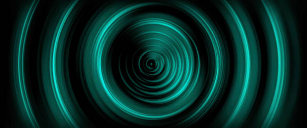 istock Abstract Radial Spinning Spiral of Rotating Circles - whirling, twirling, glowing, vortex - Brilliant Teal 1196259481