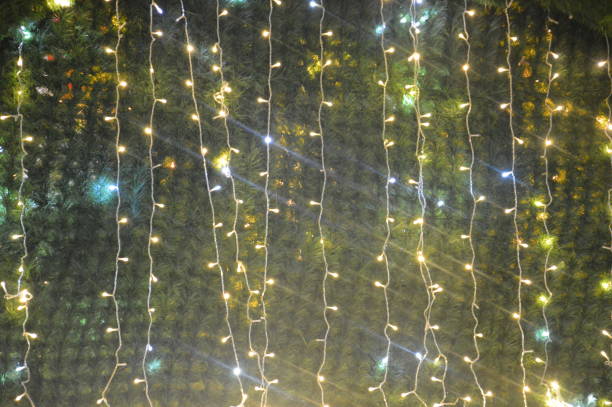 istock New Year's blurry garlands glow at night in composition 1196260514