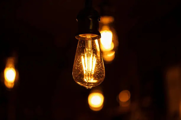 Photo of Close up glowing light bulb